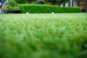 artificial green grass for background, shallow depth of field