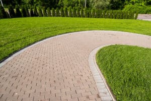 curved stone walkway from pavers in landscape design and sidewalk decoration